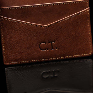 Example of embossing initials on a leather minimalist cardholder by Von Baer.