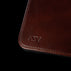 Von Baer brown leather mat featuring personalized 