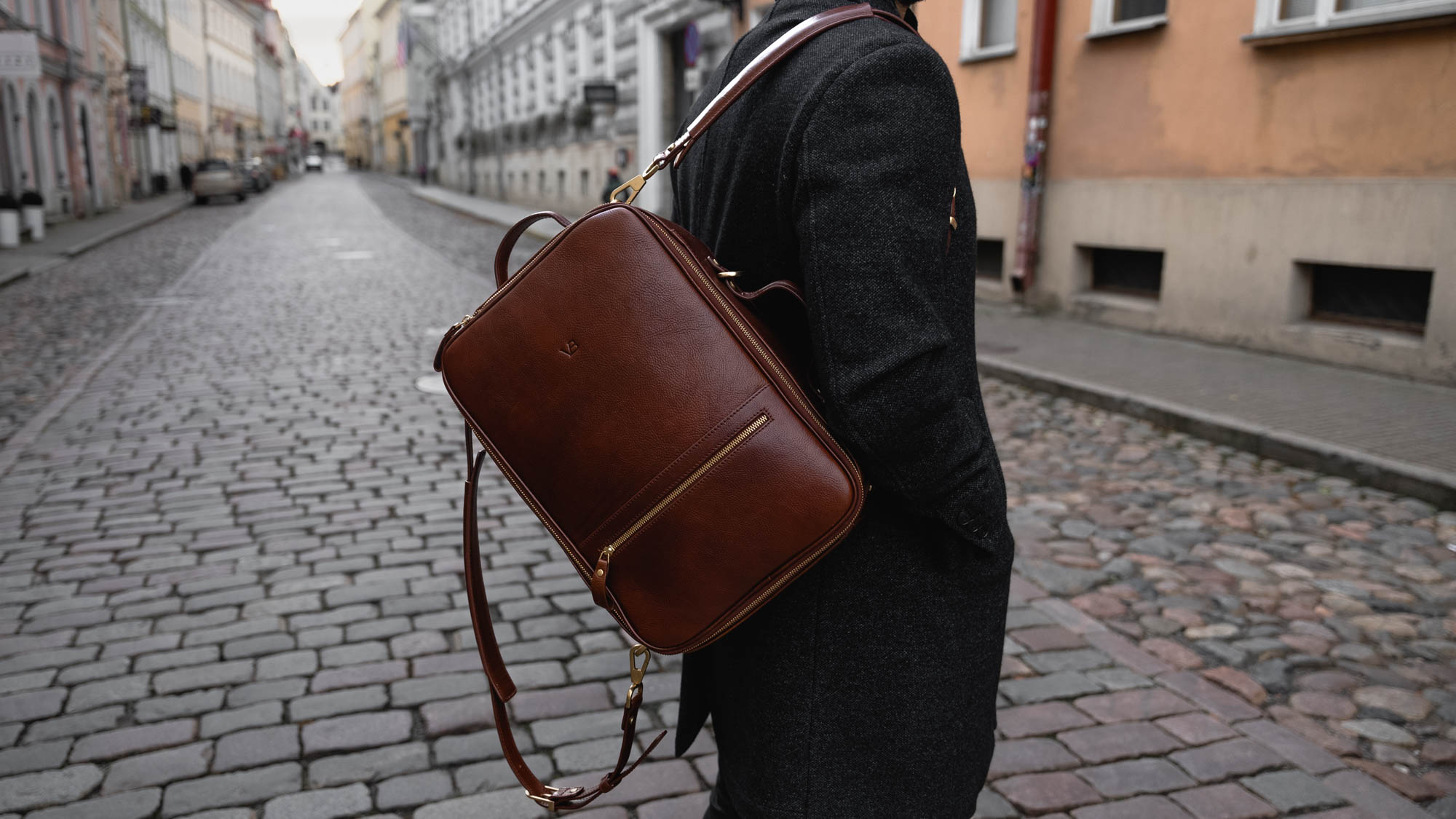 Von Baer 10x high-quality leather travel backpack in brown, perfect for carrying a camera, slider.