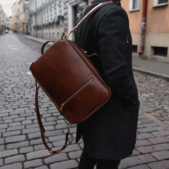 Von Baer 10x high-quality leather travel backpack in brown, designed for carrying a camera.