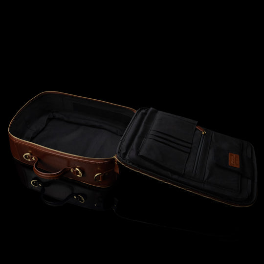 High-quality spacious leather laptop travel backpack for men, featuring an inside view, made by Von Baer. Designed with multiple compartments for organization and easy access.