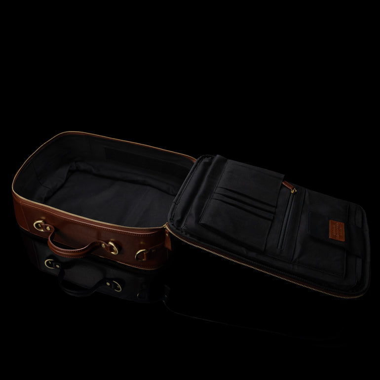 High-quality spacious leather laptop travel backpack for men, featuring an inside view, made by Von Baer. Designed with multiple compartments for organization and easy access.