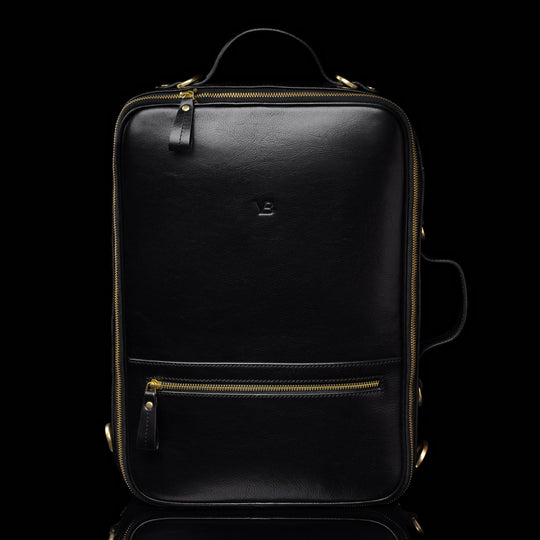 High-quality black leather laptop travel bag for men, featuring a front view, made by Von Baer. Stylish and functional for carrying laptops on trips.