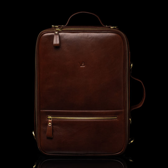 High-quality brown leather laptop travel bag for men, featuring a front view, made by Von Baer. Ideal for carrying laptops on trips with durable and stylish craftsmanship.