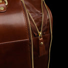 The Von Baer 10x men's high-quality leather laptop travel bag with an expanded zipper, showcasing the durable craftsmanship and spacious design that provides easy access and additional room for essentials during business trips or travel.