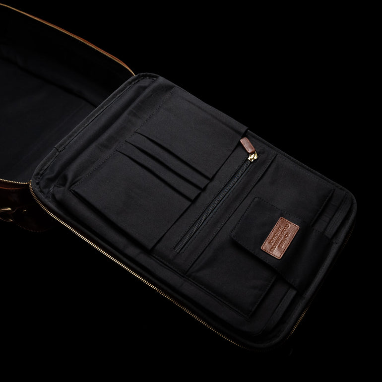 Von Baer 10x men's high-quality leather laptop travel bag with a secure laptop compartment and multiple inside pockets, designed for organization and convenience during travel.