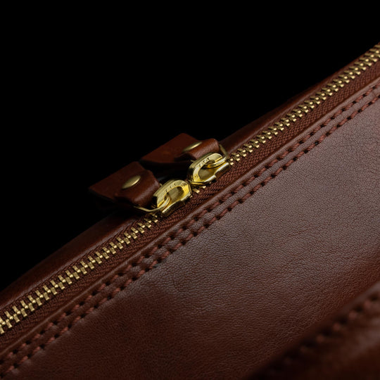 Von Baer 10x men's high-quality multifunctional leather laptop travel backpack with YKK zippers, showcasing the close-up craftsmanship and durability.