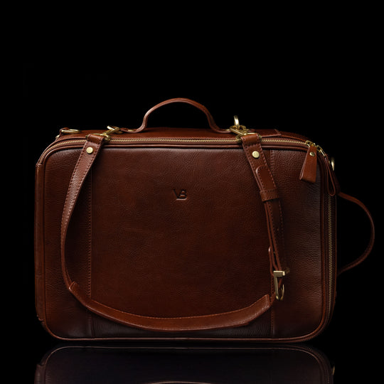 Von Baer 10x men's high-quality multifunctional leather laptop travel bag in brown, convertible into a backpack with adjustable shoulder straps.