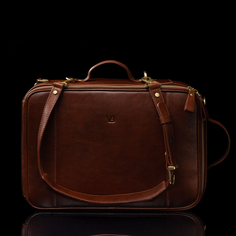 Von Baer 10x men's high-quality multifunctional leather laptop travel bag in brown, convertible into a backpack with adjustable shoulder straps.