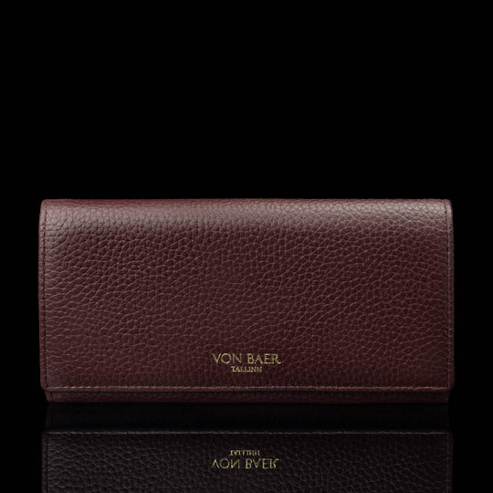 Von Baer Allure large burgundy full-grain leather accordion wallet with RFID protection and gold-tone branding, shown in a front view against a black background.