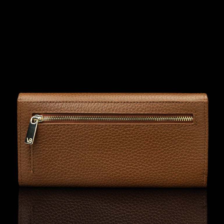 Von Baer Allure large cognac tan full-grain leather accordion wallet with RFID protection, shown in a back view highlighting the zipped outer pocket with a gold-tone zipper against a black background.
