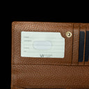 Von Baer Allure large cognac tan full-grain leather accordion wallet with RFID protection, shown in a close-up highlighting the ID window and brand logo against a black background.