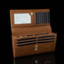 Von Baer Allure large cognac tan full-grain leather accordion wallet with RFID protection, shown open and filled with cards to highlight card slots and an ID window against a black background.