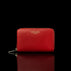 Von Baer Celeste small red full-grain leather zip-around wallet with gold-tone branding, displayed in a front view against a black background.