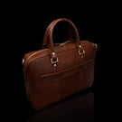 Von Baer City business leather laptop bag for women in brown, showing the luggage strap from the back view.