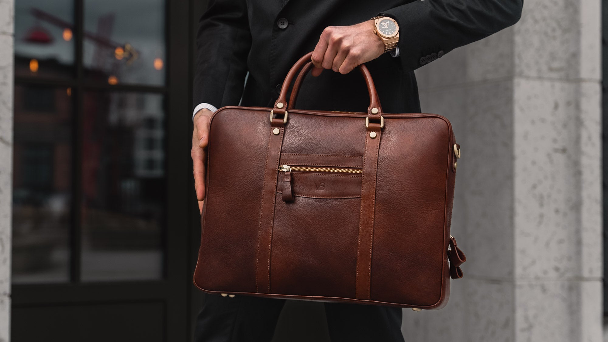 von baer city top luxurious large leather mens laptop bag for work brown carried by male model slider 3