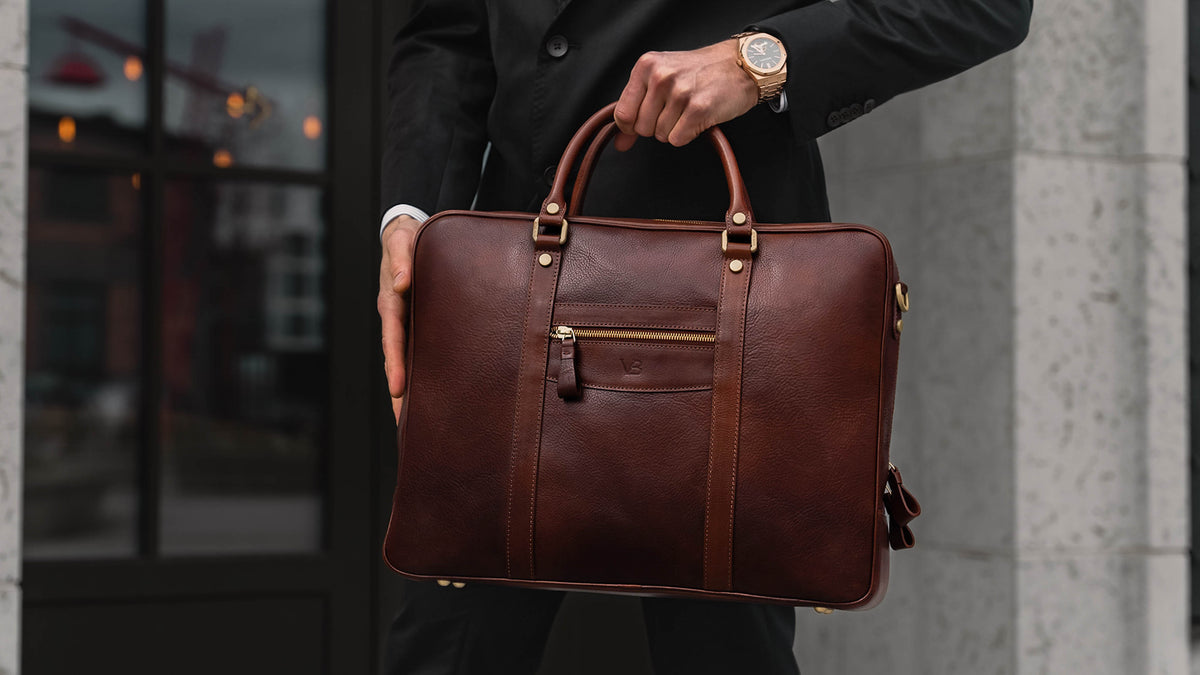 von baer city top luxurious large leather mens laptop bag for work brown carried by male model slider 3