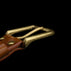 Von Baer classic leather belt in tan, with a golden solid brass buckle, close-up logo.