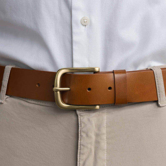 Von Baer classic luxury full-grain leather belt for men in tan, with a solid brass buckle.