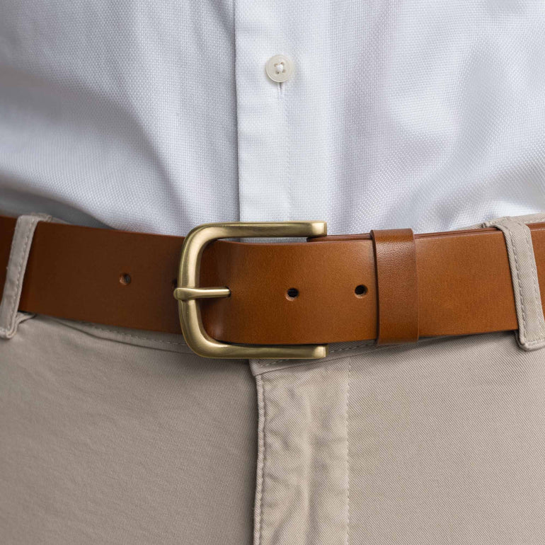Von Baer classic luxury full-grain leather belt for men in tan, with a solid brass buckle.