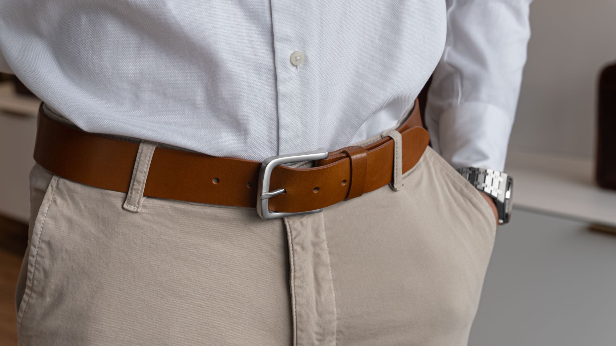 Von Baer classic luxury full-grain leather belt for men in tan, with a stainless steel buckle.