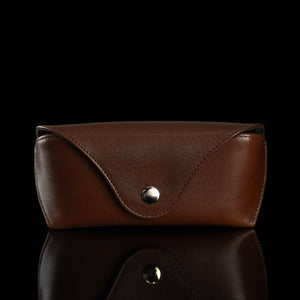 A front view of a brown Von Baer Deluxe luxury leather glasses and sunglasses case.