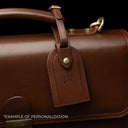 Von Baer diplomat men’s compact full-grain leather briefcase luggage tag close-up with personalized embossed initials.