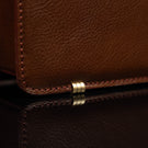 Von Baer diplomat men’s compact full-grain leather briefcase protective metal feet close-up showing durable design for professional use.