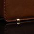 Von Baer diplomat men’s compact full-grain leather briefcase protective metal feet close-up showing durable design for professional use.