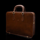 Von Baer Elegant high-quality slim full-grain leather laptop bag in brown, half-turned, for women.