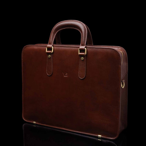 Von Baer Elegant high-quality slim full-grain leather laptop bag in brown, half-turned, for women.