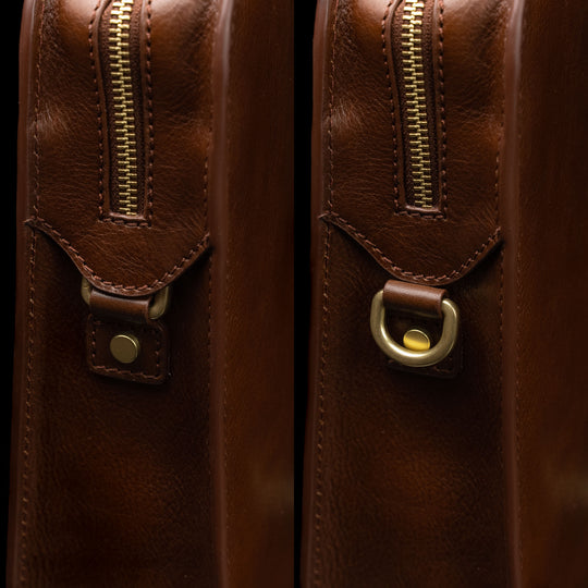 Von Baer Elegant high-quality slim full-grain leather women’s laptop bag in brown, half-turned side view with brass rings.
