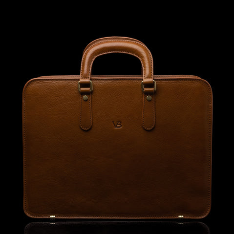 Von Baer Elegant high-quality slim full-grain leather laptop bag for women in tan, front view.