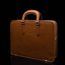 Von Baer Elegant high-quality slim full-grain leather laptop bag for women in tan, half-turned.