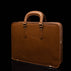 Von Baer Elegant high-quality slim full-grain leather laptop bag for women in tan, half-turned.