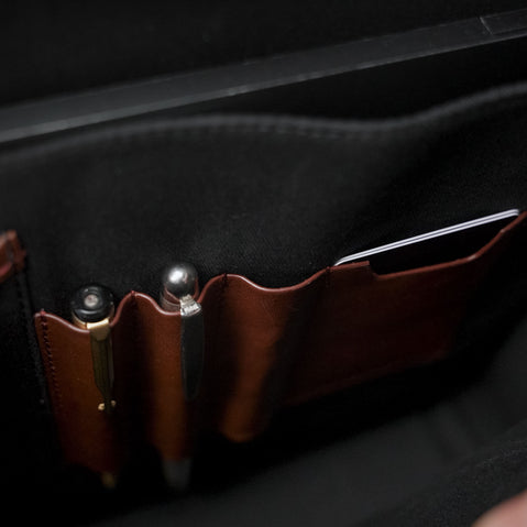 Von Baer Elegant high-quality slim full-grain leather women’s laptop bag in brown, featuring pen and card slots.
