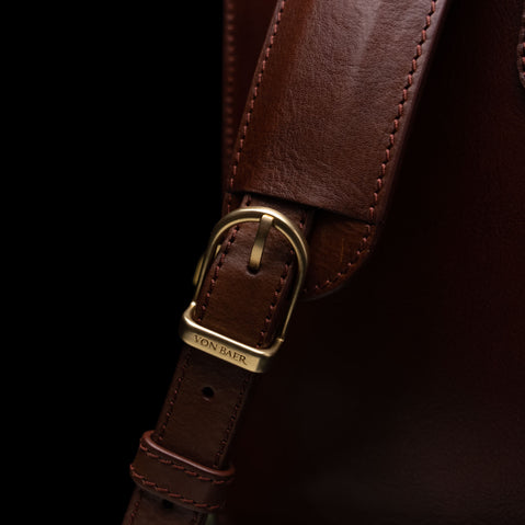 Von Baer Elegant high-quality slim full-grain leather women’s laptop bag in brown, featuring solid brass hardware.