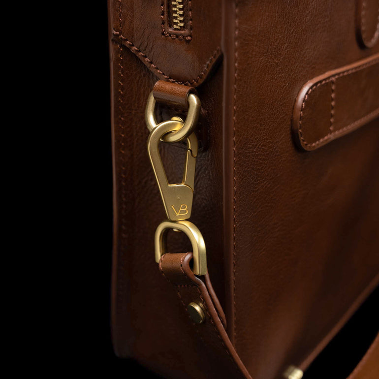Men’s Von Baer Elegant luxury slim full-grain leather laptop bag in brown, featuring a removable shoulder strap.