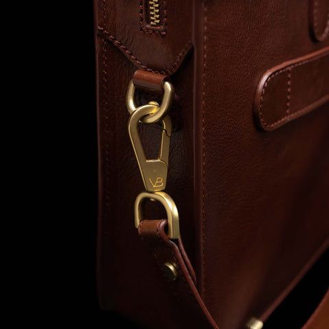 Von Baer Elegant luxury slim full-grain leather laptop bag for men in brown, featuring a removable shoulder strap.