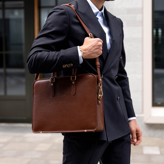 An elegant Von Baer slim leather laptop bag with a shoulder strap, for documents and essentials