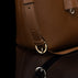 Von Baer Estelle brown leather crossbody tote bag for women, close-up of the adjustable shoulder strap with buckle and polished gold-tone hardware.
