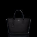 Von Baer Estelle black leather tote bag for women, shown from the front with structured top handles, pebbled leather texture, leather clochette and gold-tone logo.