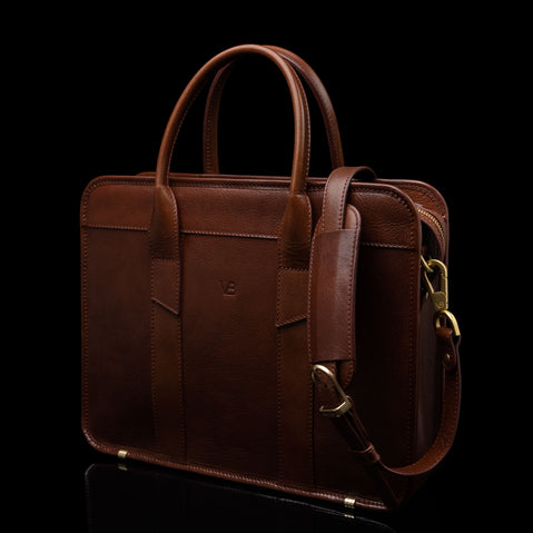Men’s Von Baer Exquisite luxury full-grain leather laptop briefcase in brown, with an adjustable shoulder strap.