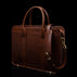 Men’s Von Baer Exquisite luxury full-grain leather laptop briefcase in brown, with an adjustable shoulder strap.