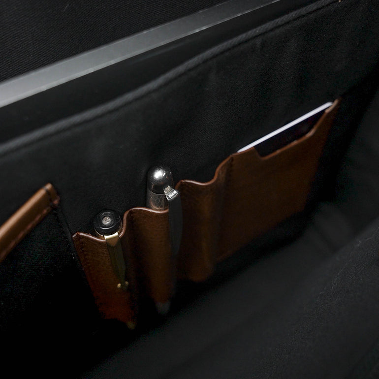 Von Baer Exquisite luxury full-grain leather laptop briefcase for women in brown, featuring card and pen slots.