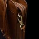 Von Baer exquisite luxury full-grain leather laptop briefcase for women in brown, showcasing a close-up of the brass hardware.