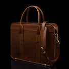 Von Baer exquisite luxury full-grain leather laptop briefcase for women in brown, with an adjustable shoulder strap.