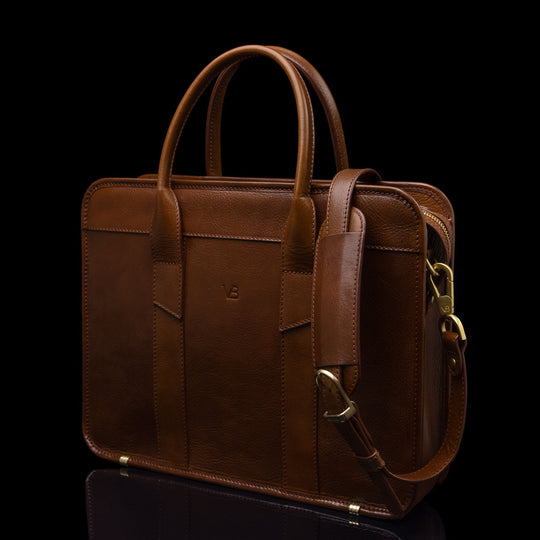 Von Baer exquisite luxury full-grain leather laptop briefcase for women in brown, with an adjustable shoulder strap.