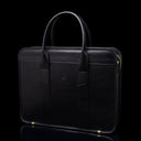 Von Baer exquisite luxury full-grain leather laptop briefcase for women and men in black color, half-turned 3D view.