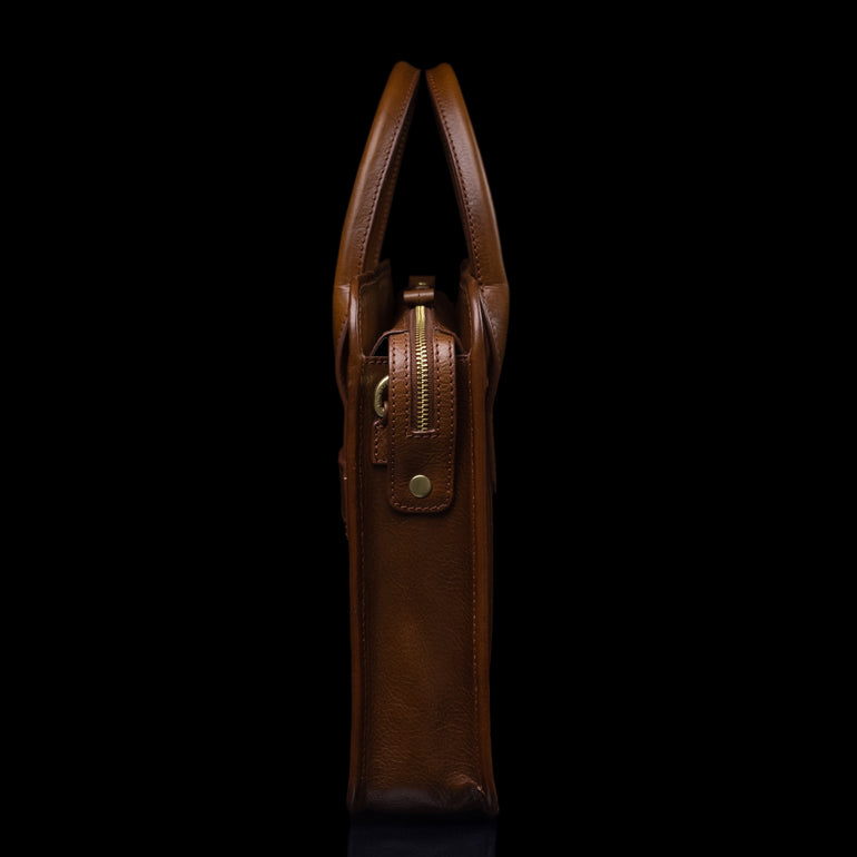 Von Baer Exquisite slim luxury full-grain leather laptop briefcase for women in brown, side view.